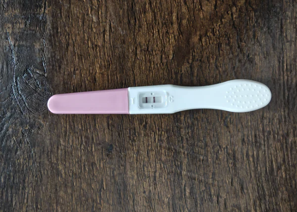 Positive pregnancy test β low count + low AMH, IVF avoided
